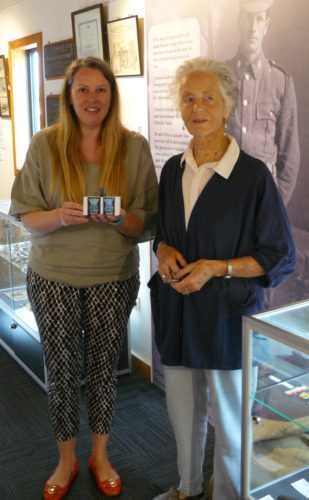 World leading egyptologist, Dr Tasha Dobbin-Bennett, holds the 3000 year amulet in Raglan Museum with Frank Gibbision descendent, Dorothy Baucke. Image Steve Soanes